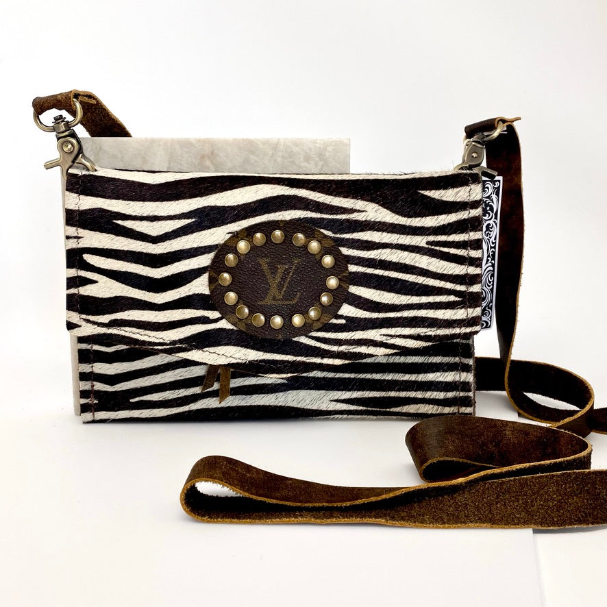 
                
                    Load image into Gallery viewer, Small Zebra Hide &amp;#39;Jordan&amp;#39; Crossbody with Genuine LV Patch by Keep It Gypsy
                
            